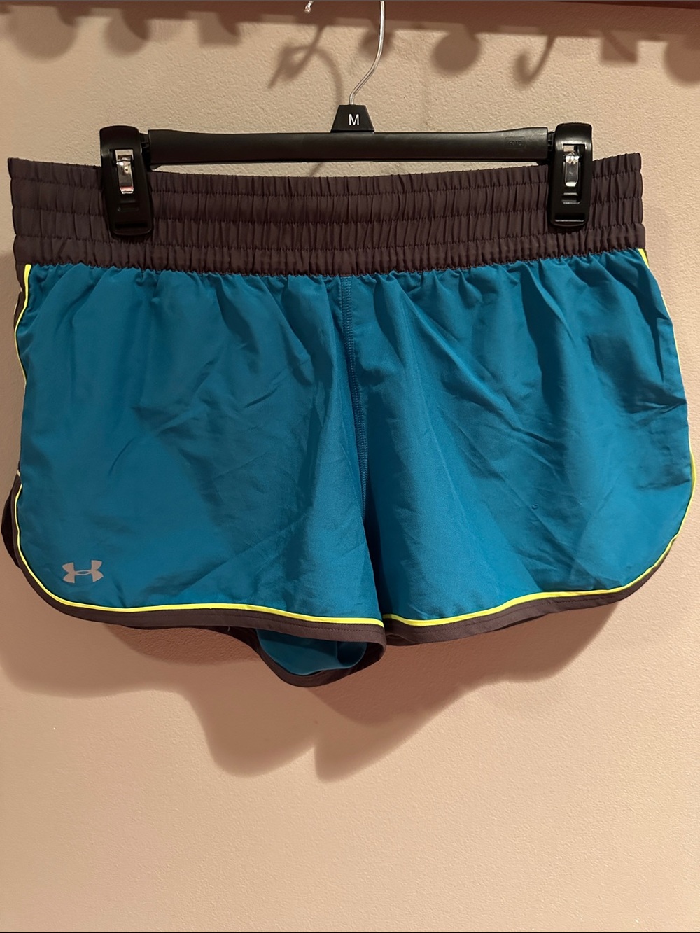 Under Armour Women's Teal Athletic Shorts with Black Waistband and Yellow Trim